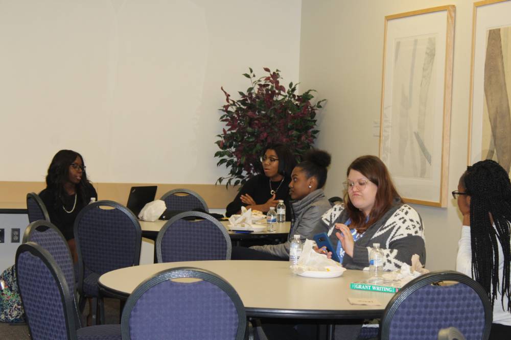 Students and faculty learning about opportunities for students to study abroad